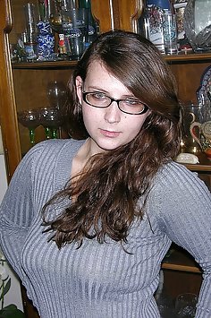 Brunette Woman Wearing Glasses Models Nude